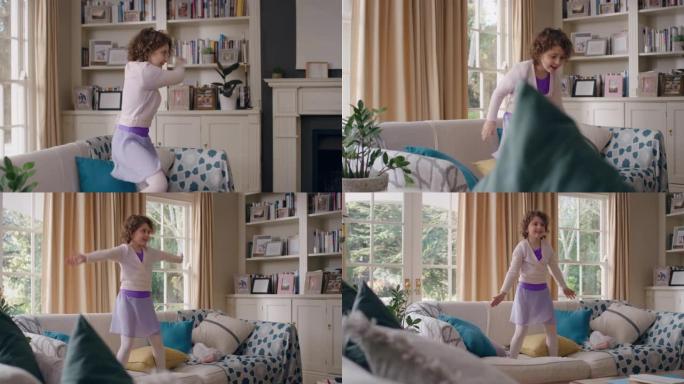 快乐的小女孩在家里跳舞，在沙发上跳有趣的舞蹈，享受童年的自由，穿着紫色连衣裙4k
