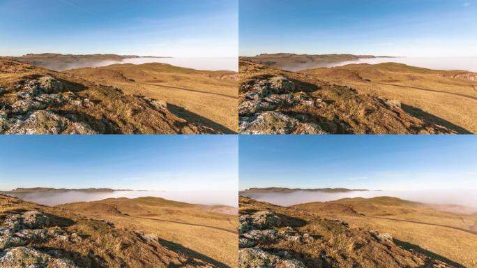 时间流逝: 英国的晨间风景与移动的雾