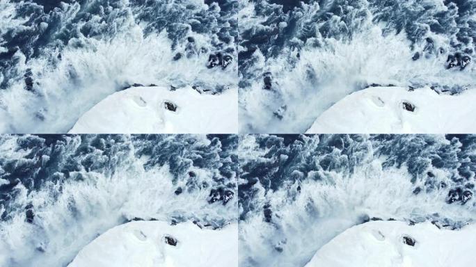 瀑布冬季边缘飞越风景史诗空中飞行冰岛著名瀑布周围的雪冰水流过高崖灵感史诗尺度自然冒险