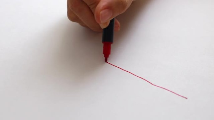 在白纸上手工绘制红色直线