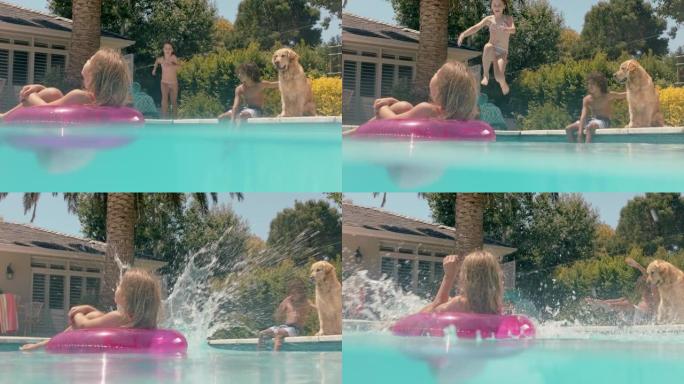 小女孩跳进游泳池嬉戏地溅朋友在水上一起玩乐漂浮物享受夏天和妈妈看着孩子们玩耍