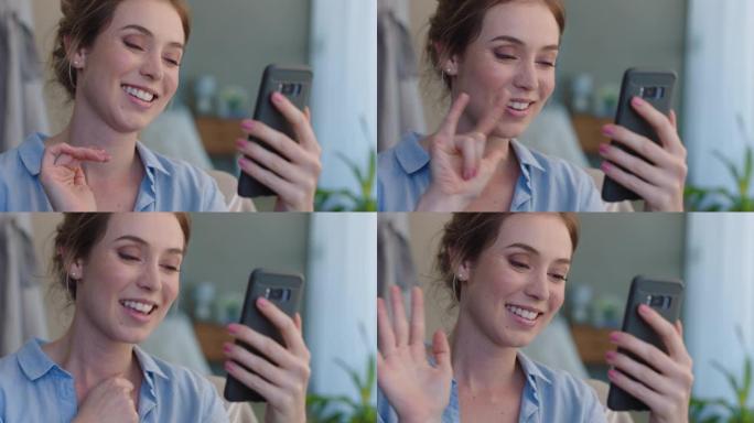 美丽的聋哑女人使用智能手机视频聊天手语与手势享受在线交流