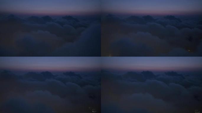 飞越云层黄昏时间穿越云层视频素材