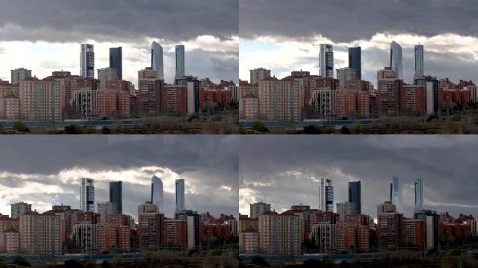 在多云的下午，马德里市四座最高摩天大楼的时间流逝