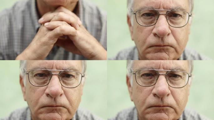 戴眼镜的悲伤高加索老人的肖像