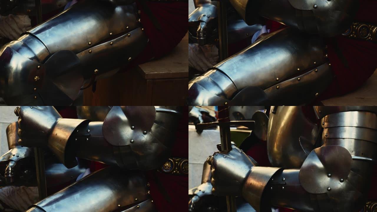 身着中世纪盔甲的中世纪骑士的特写细节