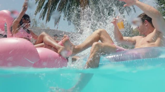 泳池派对有趣的人跳进游泳池，在游泳管上溅朋友，玩得开心，人们在彩色游泳花车上庆祝暑假，享受夏日4k