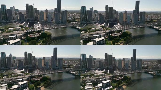 布里斯班故事桥和布里斯班河上现代办公楼的4k鸟瞰图实时镜头