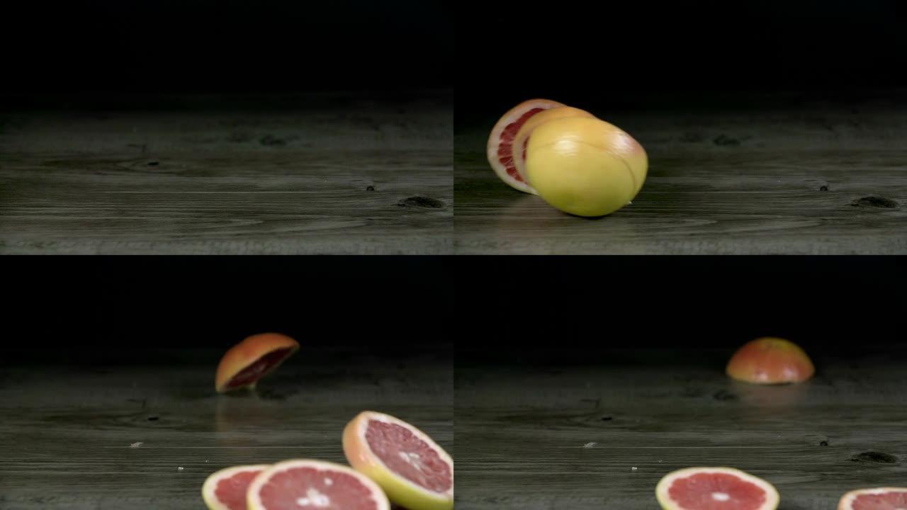 高清慢速: 切成薄片的葡萄柚卷入屏幕并分崩离析