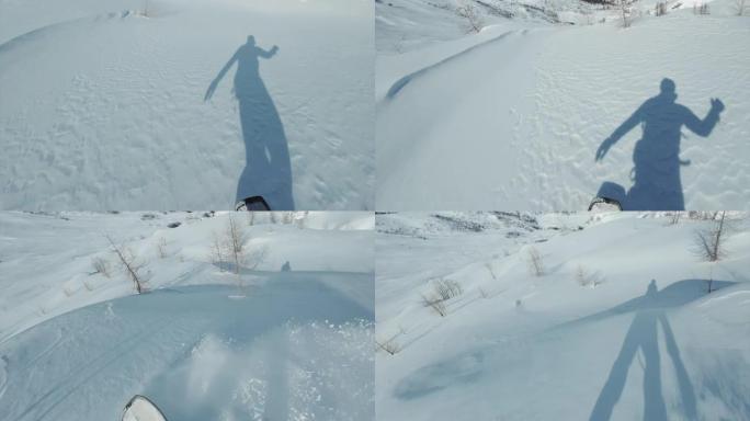 冬季在未触及的偏远山区的新鲜粉末雪上滑雪