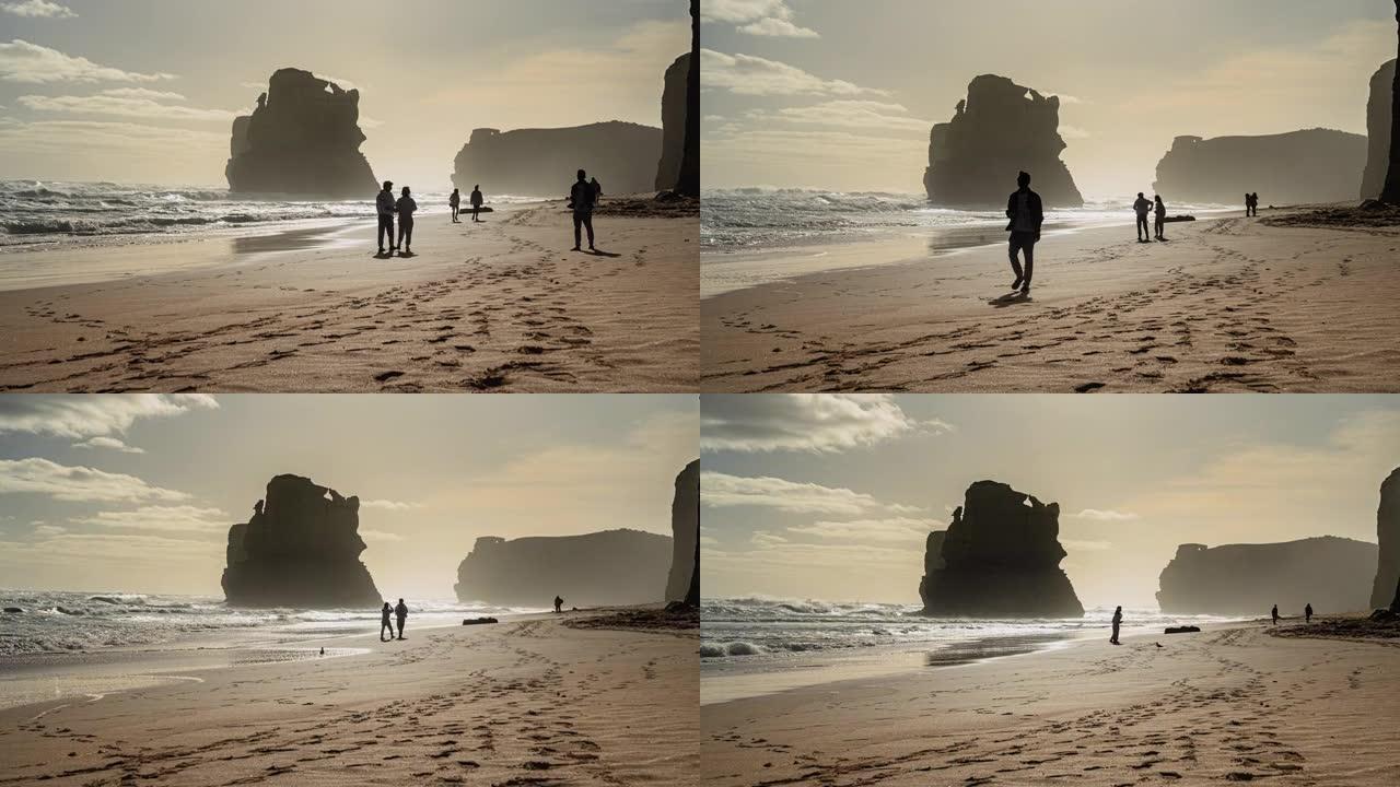 游客的时间流逝，在澳大利亚维多利亚州墨尔本大洋路的吉布森台阶风景秀丽的海边悬崖和海滩上漫步