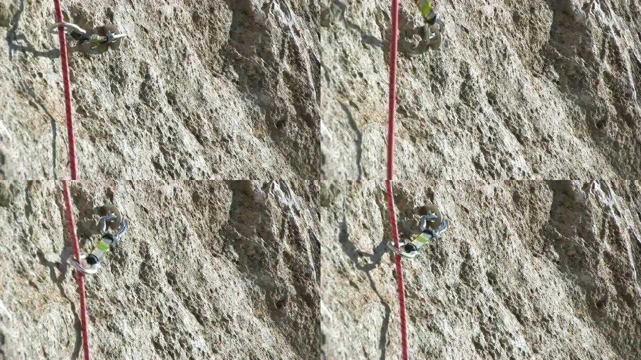 攀登设备。拉伸约束系绳。备份安装在岩石上。