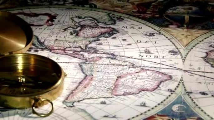 黄金指南针，蜡烛，旧地图，特写