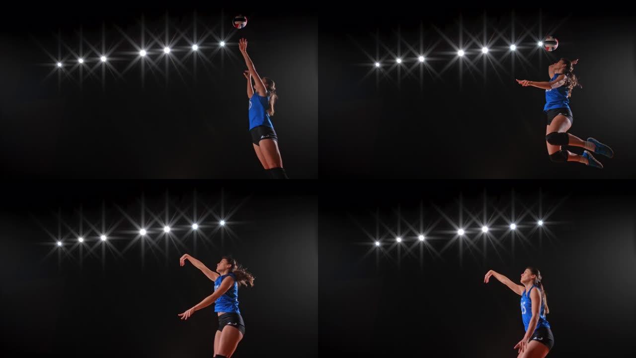身穿蓝色球衣的SLO MO女子排球运动员跳空击球