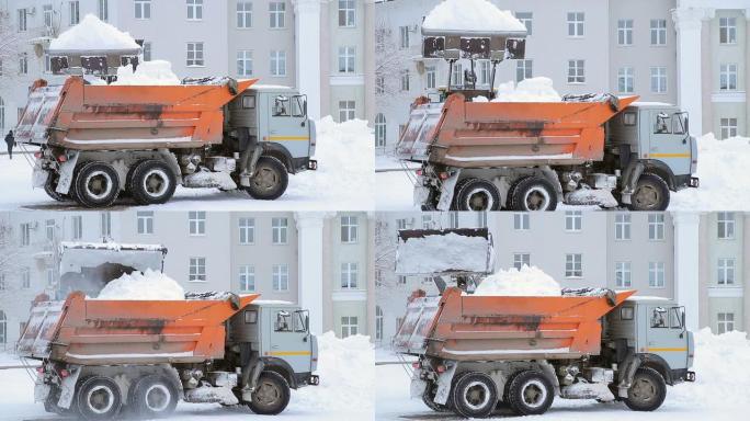 挖掘机铲斗卡车中的积雪