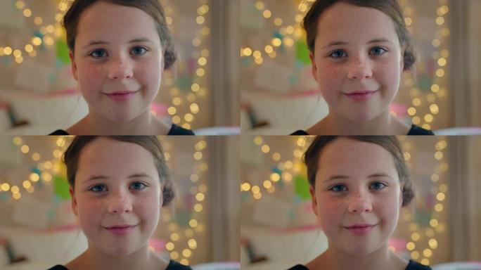 肖像美丽的雀斑小女孩微笑快乐地看着相机童年的概念