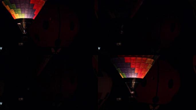 许多气球在夜间飞行