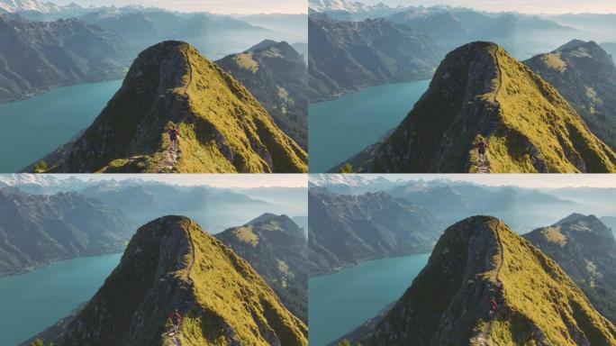 在瑞士阿尔卑斯山因特拉肯的背景下徒步旅行的人的鸟瞰图