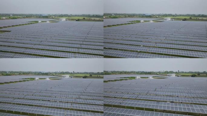 太阳能电池板农场的空中透视，该农场生产环保电力。