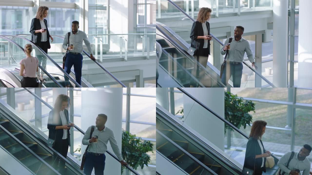 自动扶梯上的商人聊天非裔美国商人与女高管同事交谈，讨论公司办公室大堂的工作4k