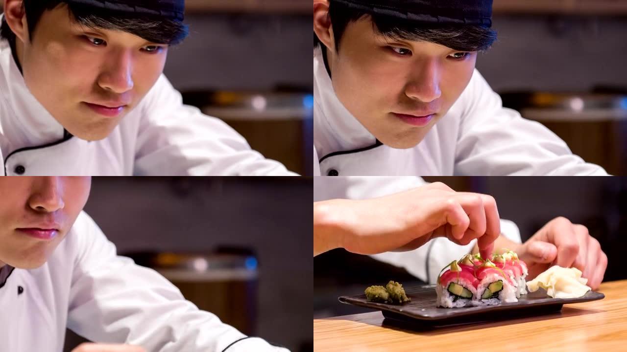 微笑的亚洲厨师的跟踪镜头为他的面包卷做最后的触摸