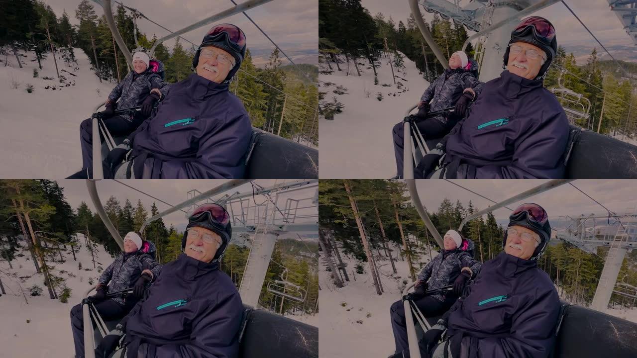 带着女儿在滑雪缆车上的老人，在冬天欣赏大自然的景色