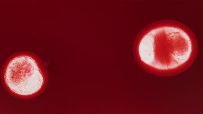 漂浮在空间合并背景中的红细胞液滴