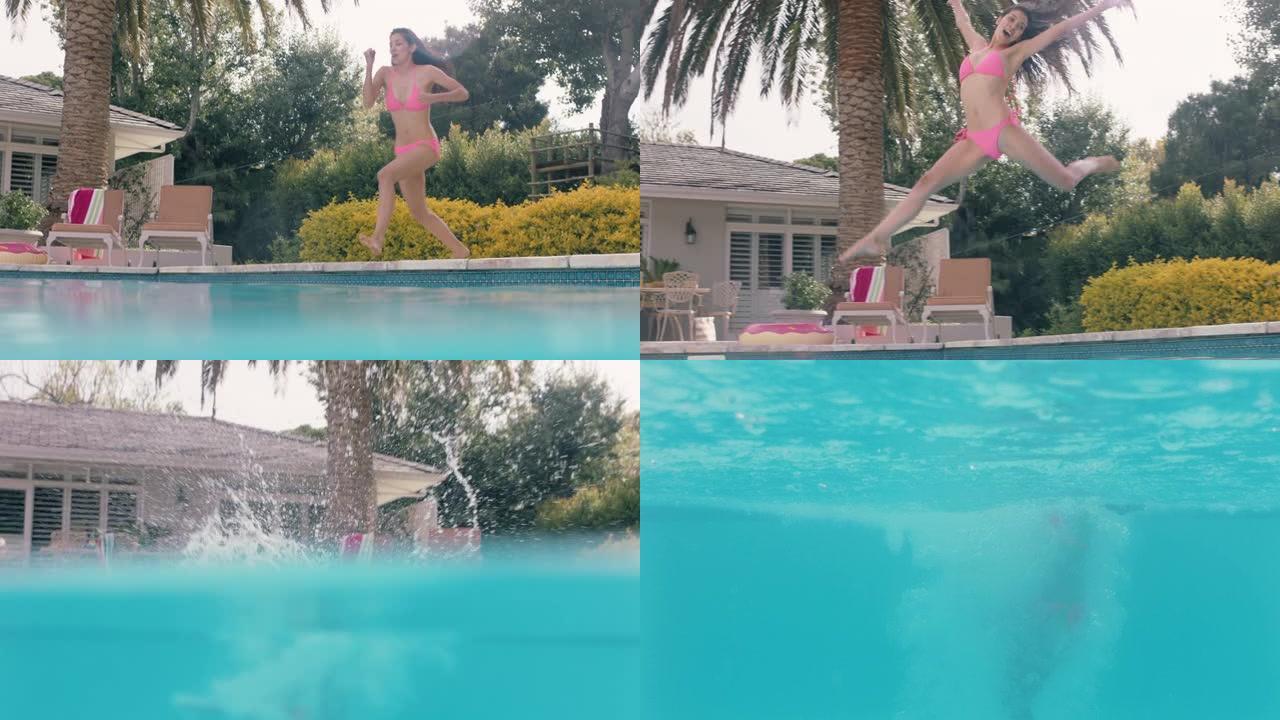 美丽的女人跳进游泳池溅水下玩得开心暑假享受夏天穿着粉色比基尼4k镜头