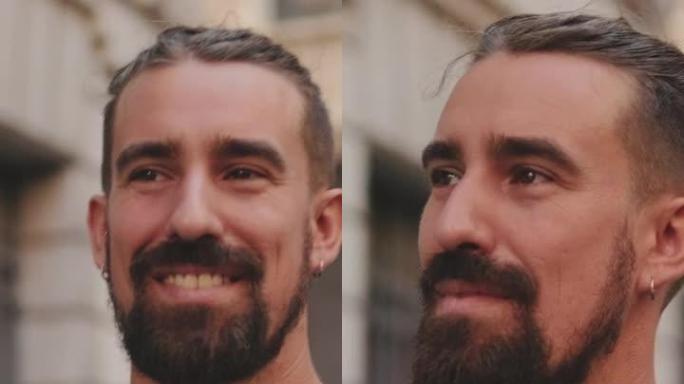 垂直视频: 年轻微笑的男人的特写镜头，留着胡须，四处张望