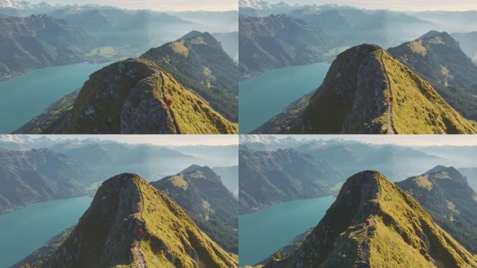 在瑞士阿尔卑斯山的因特拉肯背景下奔跑的人的鸟瞰图