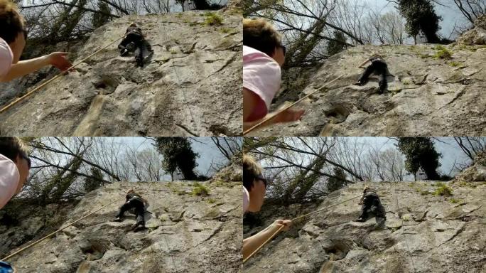 女性登山者滑倒