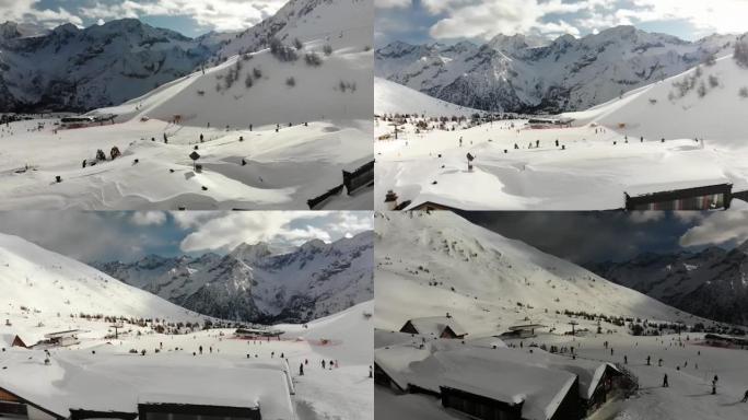 南蒂罗尔人的单板滑雪和滑雪的航拍视频