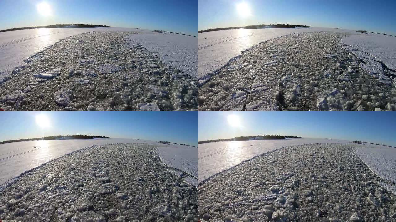 芬兰拉普兰的破冰船穿过厚厚的冰海。高角度