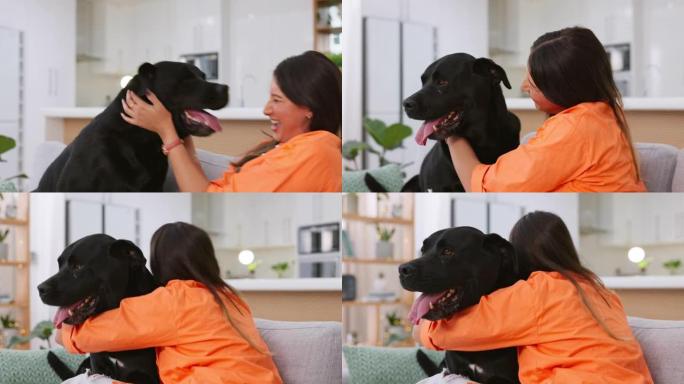 女人，狗和在客厅的沙发上拥抱在一起，在家中与宠物的乐趣，爱情和幸福的友谊。朋友，与宠物和幸福共度美好