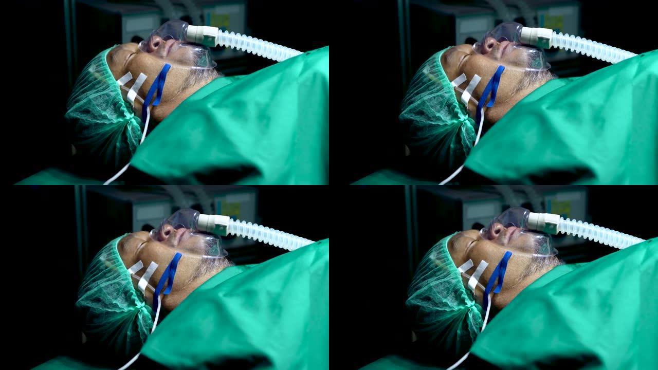4K，患者因手术前接受全身麻醉而安静地躺在手术室，医生给患者戴上了用绿色布覆盖自己的氧气面罩。