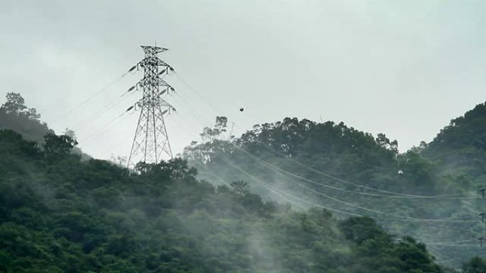 雨后送电电网大山铁塔输电铁塔高压输送