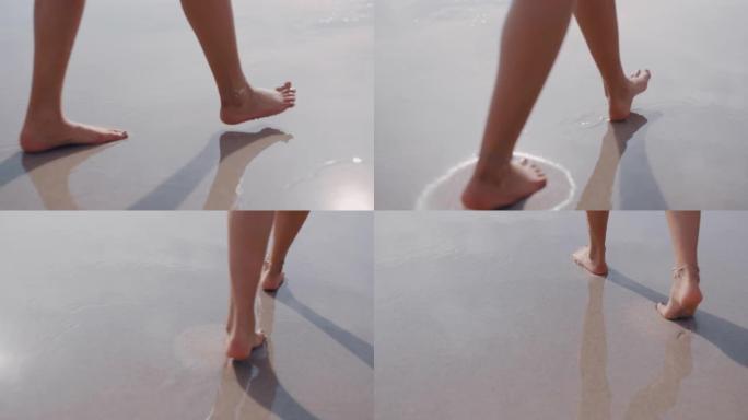 近距离女子脚赤脚走在海滩上享受温柔湿润的海沙暑假女游客