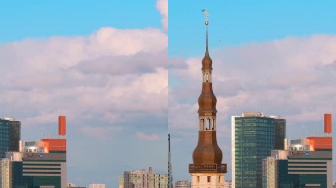 爱沙尼亚塔林-2019年7月1日: 市政厅塔以现代城市摩天大楼为背景。垂直镜头视频城市中心建筑。缩小