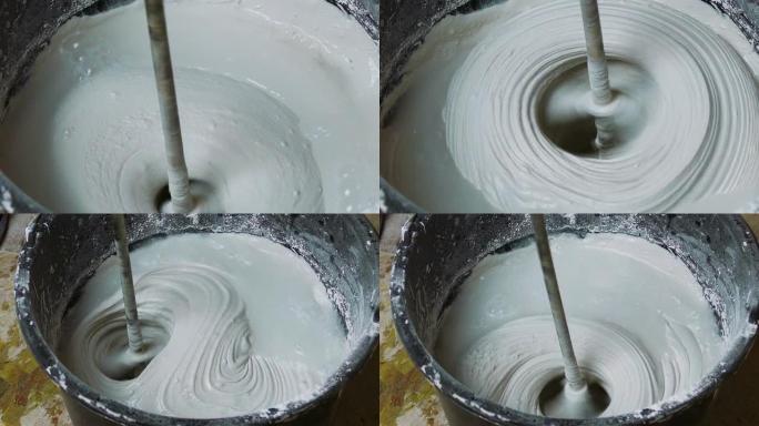 浸入石膏混合物中的旋转搅拌器