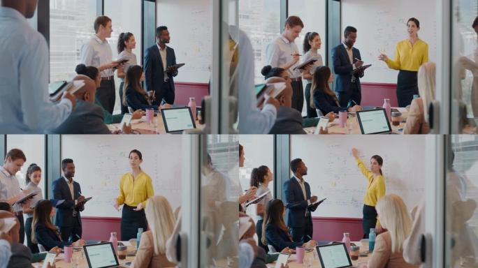 女商人在办公室会议上在白板上展示想法，与公司团队项目经理在会议室演讲中与同事讨论战略