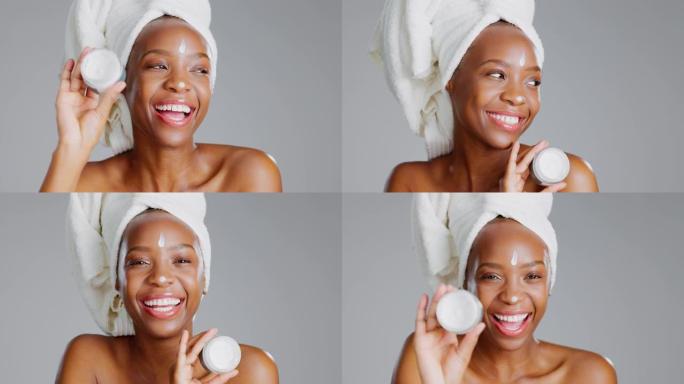 面部，面霜和美容与一个模特黑人妇女在工作室的灰色背景下进行护肤治疗。肖像、毛巾和乳液产品，有吸引力的
