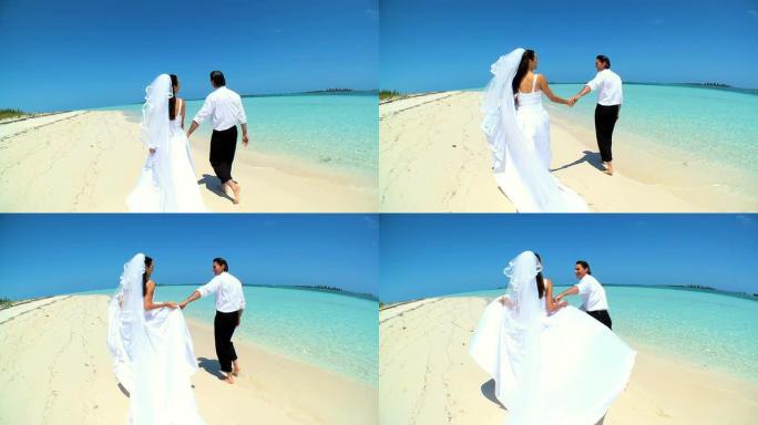天堂海滩上的赤脚婚礼夫妇