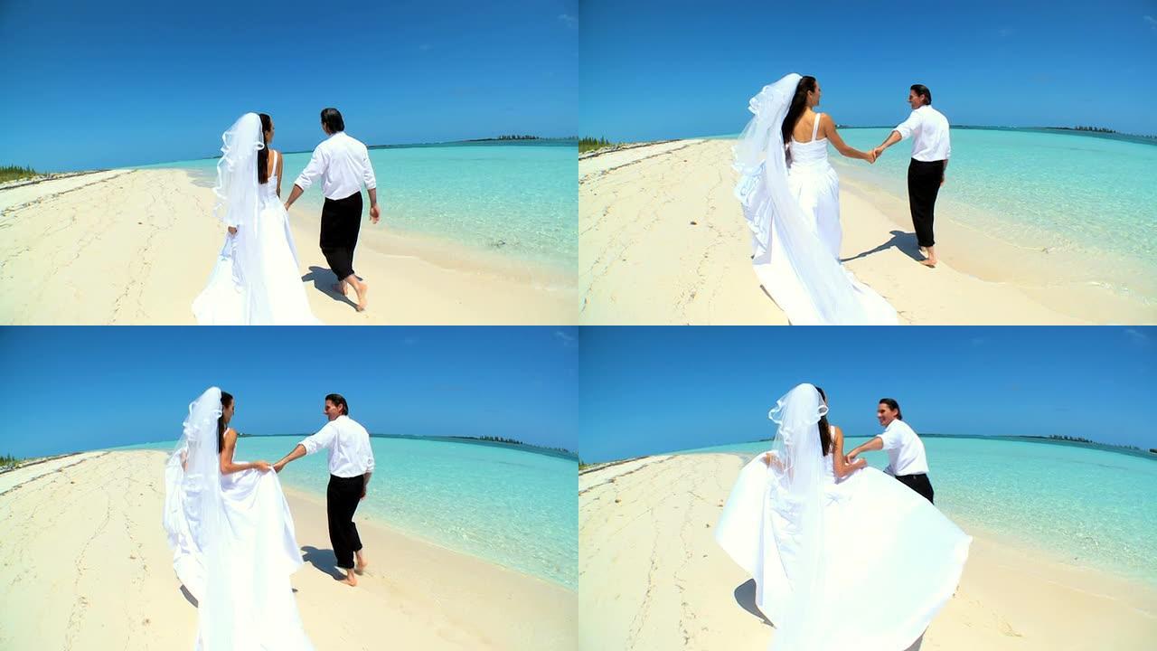 天堂海滩上的赤脚婚礼夫妇