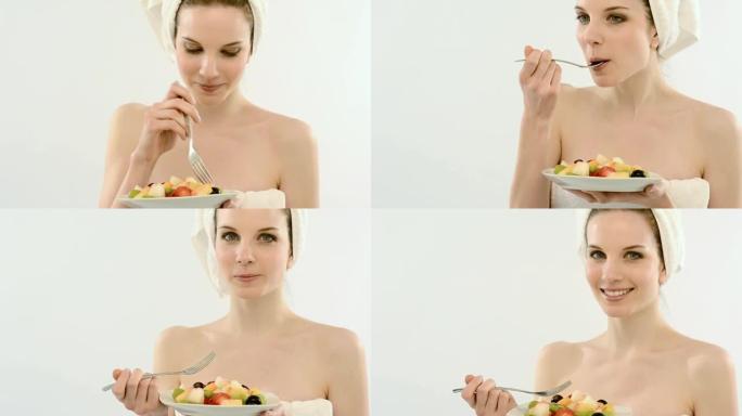 吃水果沙拉的美女; 全高清照片JPEG