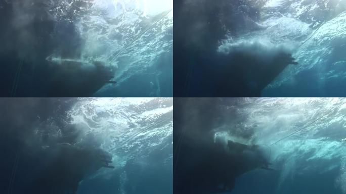 从水下看到船和强浪。