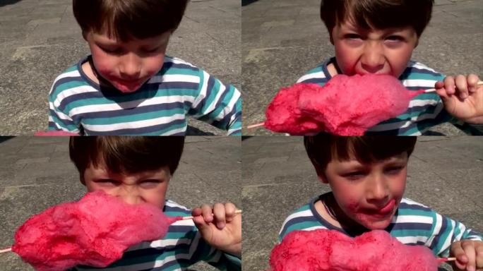 小男孩正在吃棉花糖