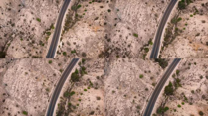 加利福尼亚州先锋镇附近一条铺好的道路的空中无人机镜头。