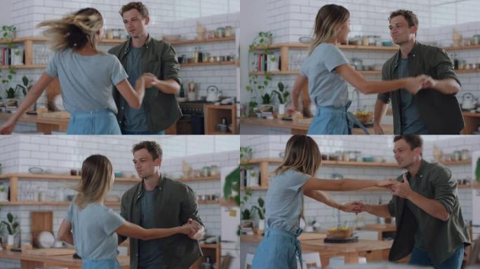 幸福的夫妇在厨房跳舞，庆祝一起跳舞，享受有趣的浪漫关系，在家4k镜头