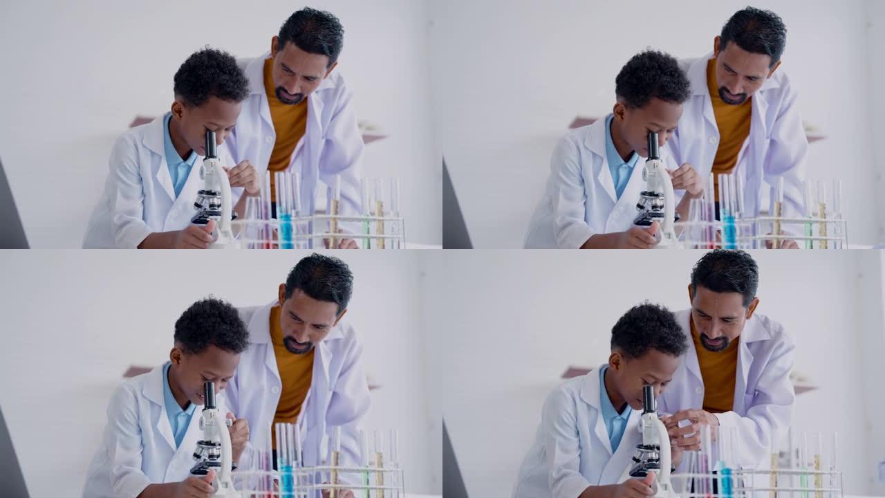 4K，亚洲男老师正在学校科学实验室向非洲小学生介绍显微镜。学童学习操作显微镜会特别注意好奇