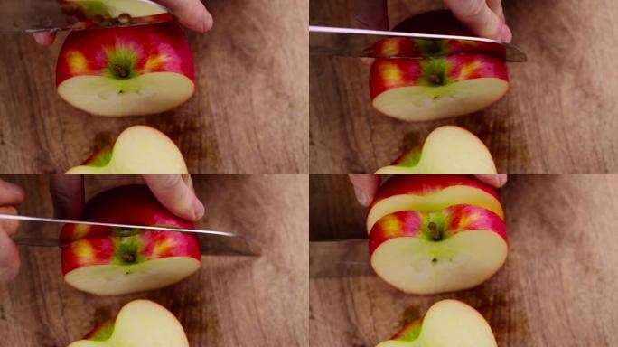 在桌子上切成块的成熟脆皮苹果
